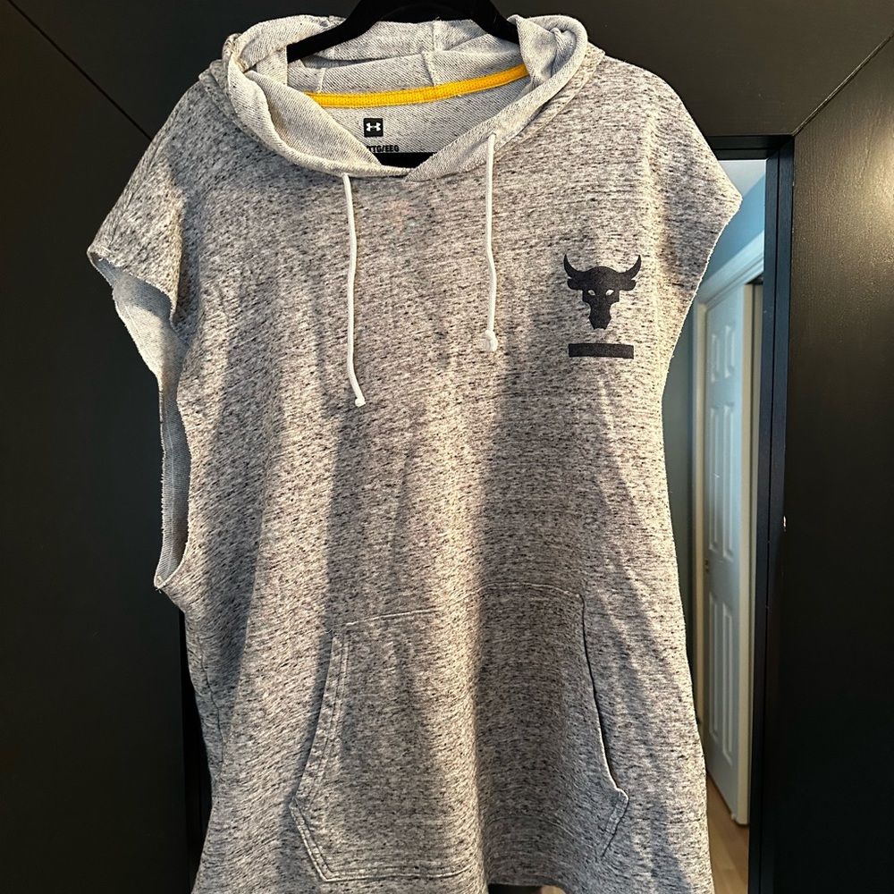 Project Rock. under armor brand.  Nice workout Shirt